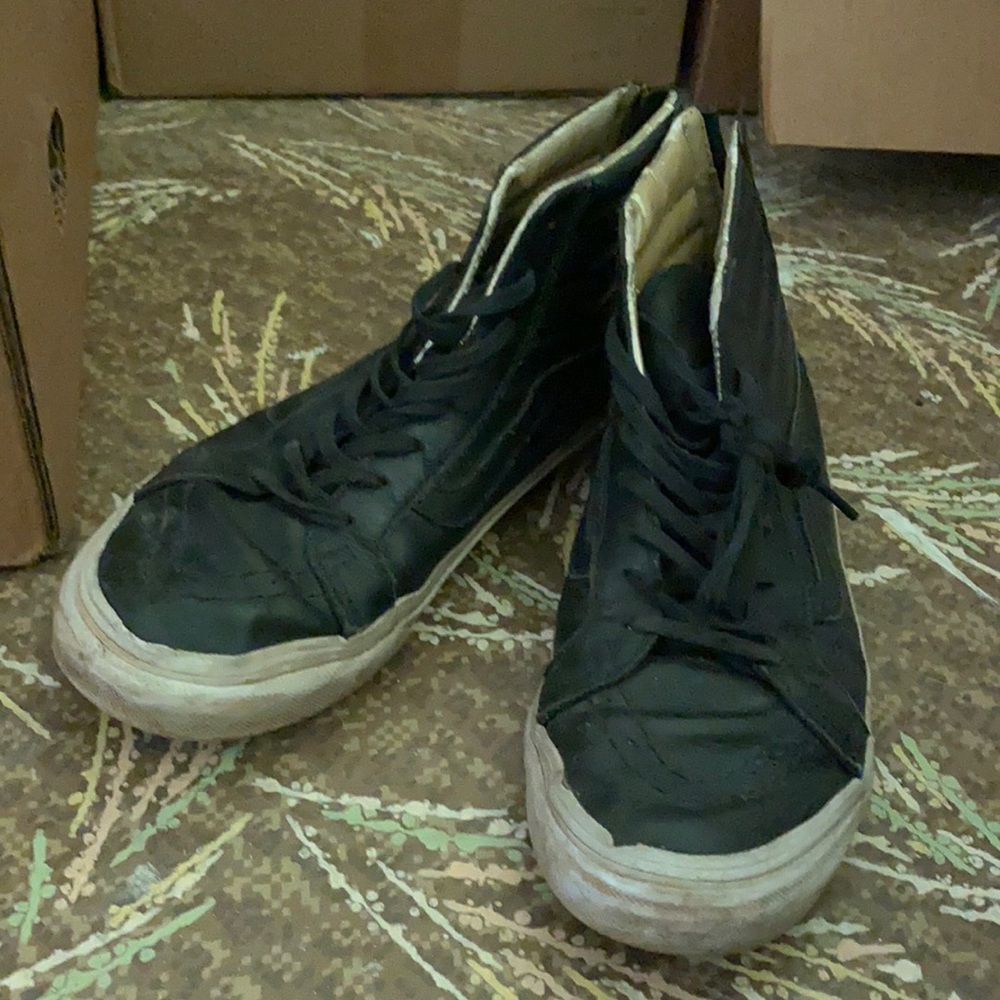 Black and gold zip up vans